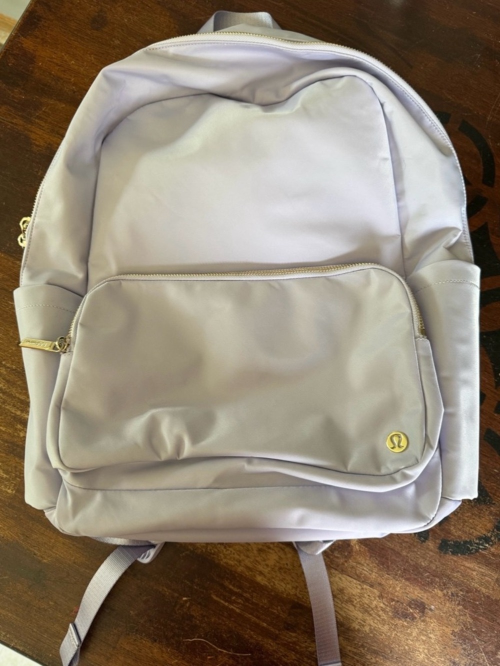 Lululemon Everywhere Backpack in Lavender Frost with gold metal hardware